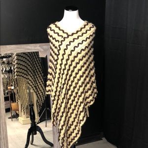 Brown and tan pullover poncho with tassel fringe